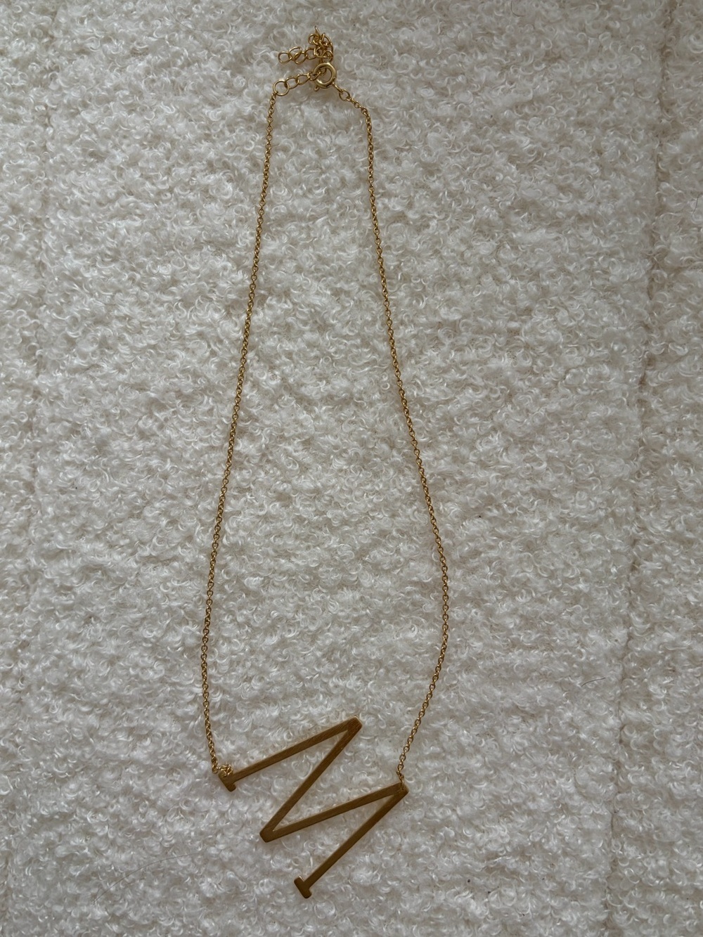 Gold M necklace